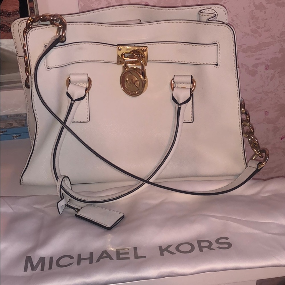 White Michael Kors purse with coverbag included